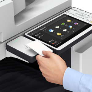 Man scanning card on a copier
