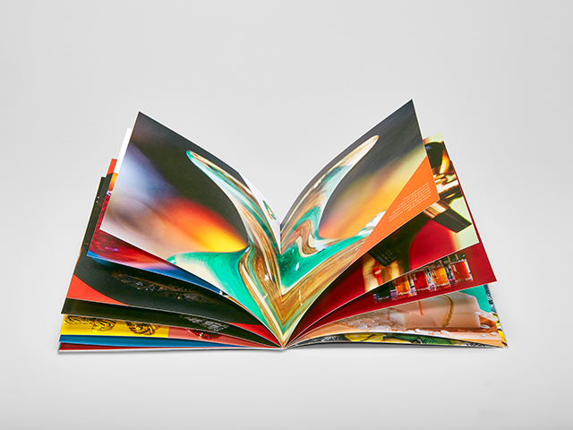 Brightly colored magazine with pages open for reading